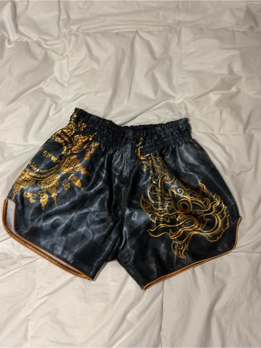 Black & Gold Athletic Muay Thai Shorts with Ornate Dragon Print